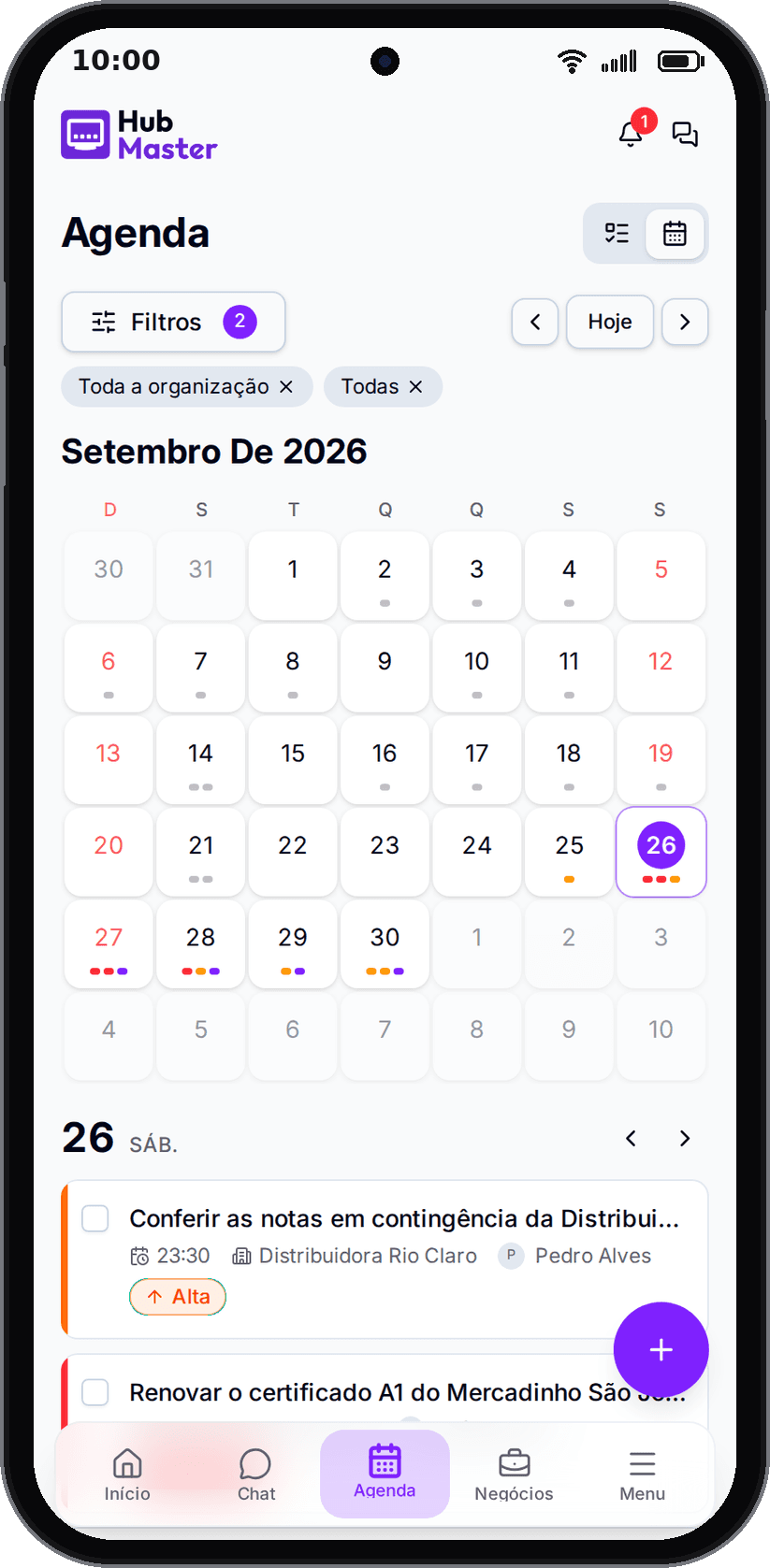 Agenda no celular: calendário compacto do mês e a lista do dia escolhido.
